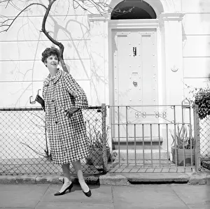 190s: Advertisement for Burberry overcoats