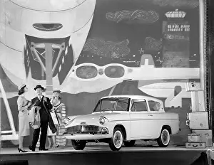 950s: Advertisement for Ford Anglia cars