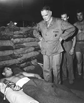 Admiral William Halsey visiting a sandbagged hospital
