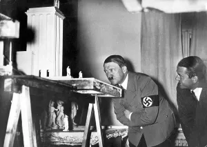 Speers: Adolf Hitler with Albert Speer in front of the model of the
