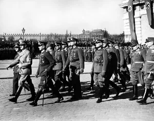 Amidst: Adolf Hitler during the annexation of Austria