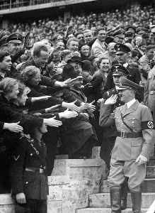 Hoping: Adolf Hitler arrives in Olympic Stadium, National Holiday