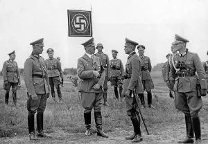 Converses: Adolf Hitler attends a troop exercise at Borne 1938
