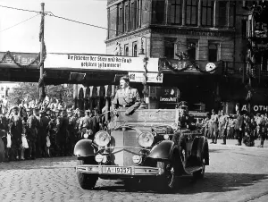 Jubilant: Adolf Hitler in car driving through Berlin