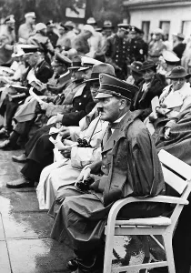 Follows: Adolf Hitler during a competition at the Olympic Games, 1936