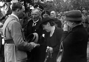 Immediately: Adolf Hitler condoles with a widow, 1930s