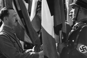 Consecration: Adolf Hitler consecrates flags, 1934