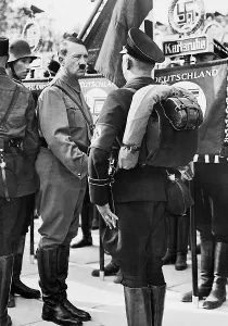 Links: Adolf Hitler at the consecration of an SS regiment, 1934