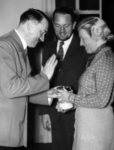 Contributes: Adolf Hitler contributes to donation box, 1934