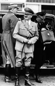 Brueckner: Adolf Hitler with a dog whip, 1924