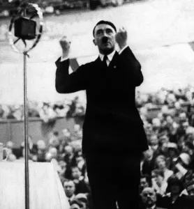 Gestures: Adolf Hitler during an election campaign speech, 1930