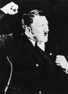 Improve: Adolf Hitler exerts speaker poses in front of the