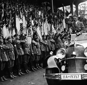 Convertible: Adolf Hitler greets from the convertible, 1933
