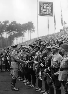 Handshake: Adolf Hitler and guests of honour at the laying