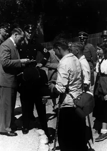 Hiker: Adolf Hitler hands out autographs, 1935