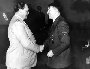 55th: Adolf Hitler and Hermann Goering shake hands