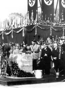 Omen: Adolf Hitler hitting the foundation stone, Munich