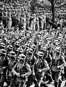 Thus: Adolf Hitler invading Warsaw, 1938