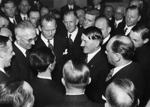 Surround: Adolf Hitler with journalists, 1934