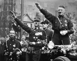 Links: Adolf Hitler at the march-past of the SA-formations