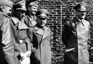 Amann: Adolf Hitler with Max Amann and Ernst Schmied, 1940