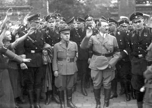 Bergstrasse: Adolf Hitler and Max Amann with SS escort