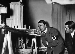 Modell: Adolf Hitler with a model for the world exhibition, 1936