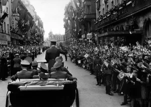 Calls: Adolf Hitler moves into Munich after the victorious