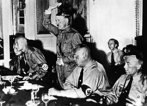 Entered: Adolf Hitler at an NSDAP meeting, 1932
