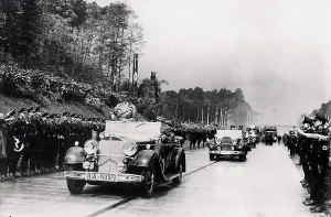 Darmstadt: Adolf Hitler passes, standing in his car on May 19