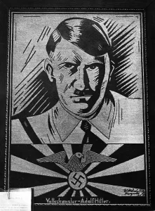 Depictions: Adolf Hitler picture on a pinhole