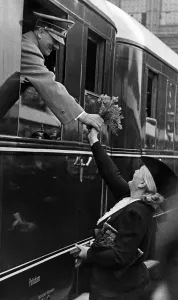 Anhalter: Adolf Hitler is presented with a bouquet of flowers, 1938