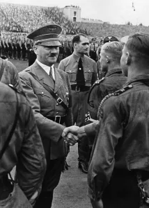 Luitpold: Adolf Hitler and Rudolf Hess with HJ, 1935