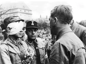 Unbroken: Adolf Hitler with an SA man (left) and an SS man