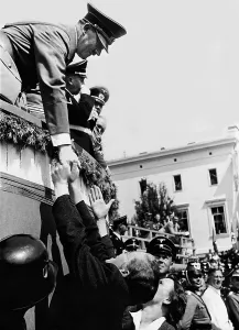 Bends: Adolf Hitler shakes hands, 1938