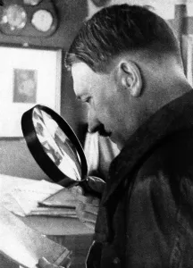 Fhrer: Adolf Hitler studies a map of Austria, 1938