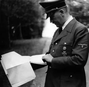 Reviewing: Adolf Hitler studying files, 1940