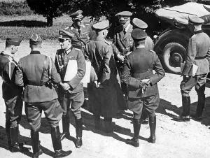 Discusses: Adolf Hitler visits the the troops