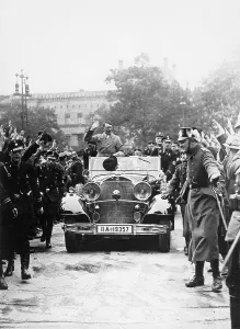 Accompany: Adolf Hitler on the way to a Reichstag session, 1933
