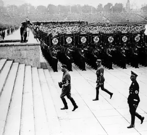 Troopers: Adolf Hitler on his way to the tribune during the NS par