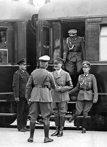 Adjutant: Adolf Hitler on the way to a troop exercise 1938