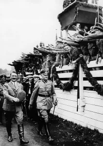 Hailed: Adolf Hitler, Werner von Blomberg and Hermann Goering at