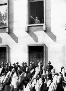 Gruss: Adolf Hitler at the window of the Reich Chancellery, 1934