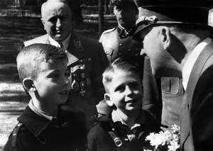 Congratulate: Adolf Hitler with young boys, 1942