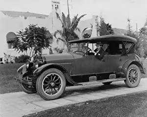 Adolphe: Adolphe Menjou in a car, 1928