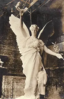 Adrian Jones with Peace sculpture