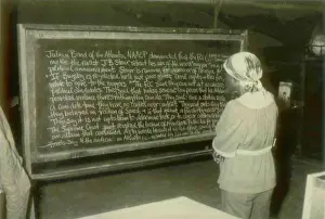 Communes: An adult education student reading about ?