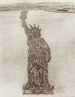 Imitation: An aerial view of a human formation of the Statue
