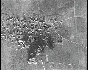 Explode: The Aerial View of a Town From Above, As Bombs