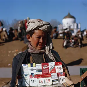 Cigs: AFGHAN BOY SELLS CIGS